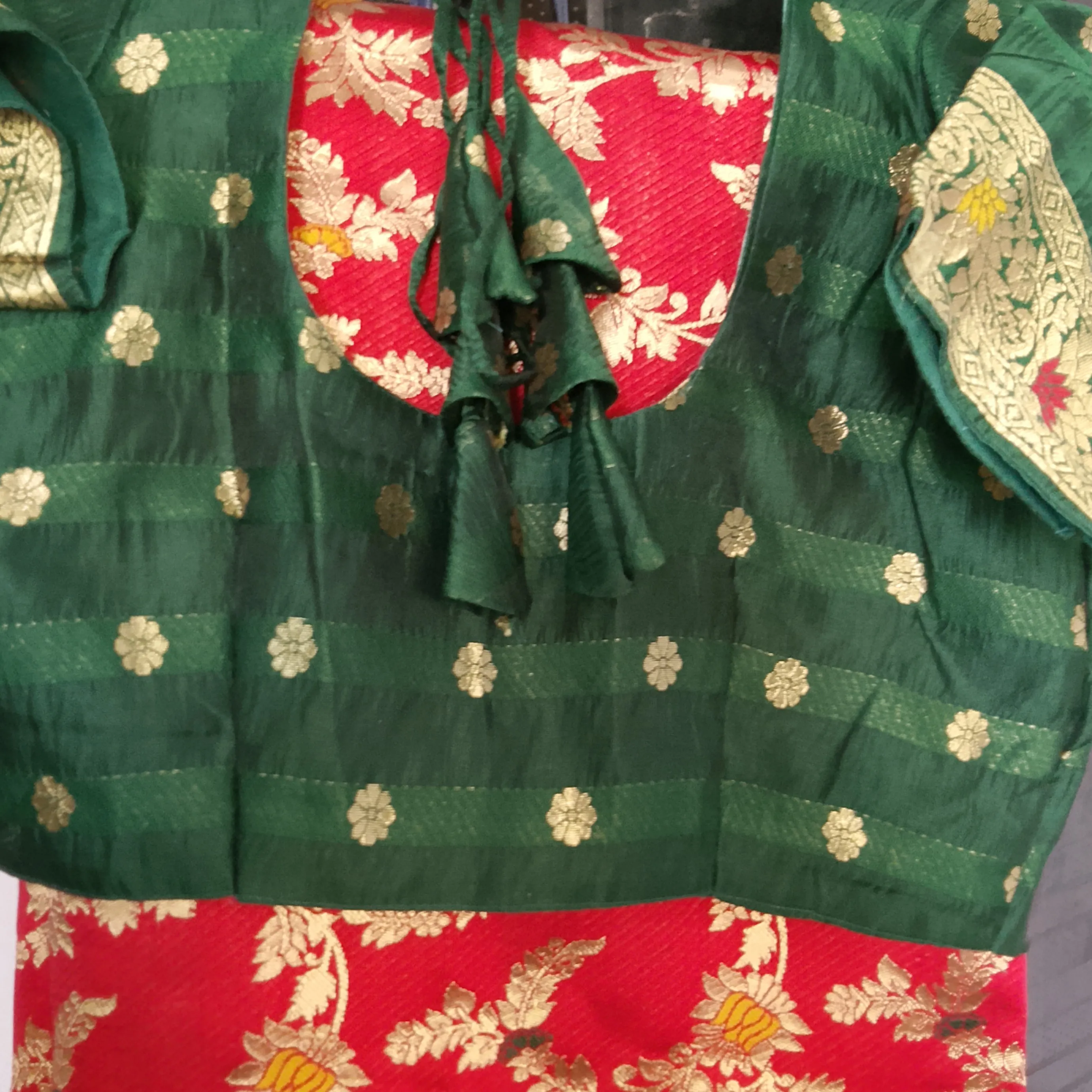 Red Banarasi Saree with Green Designer Blouse