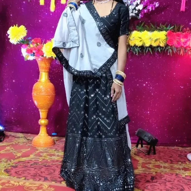 Black lehenga choli and stitched blouse — 2