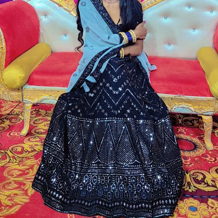 Black lehenga choli and stitched blouse